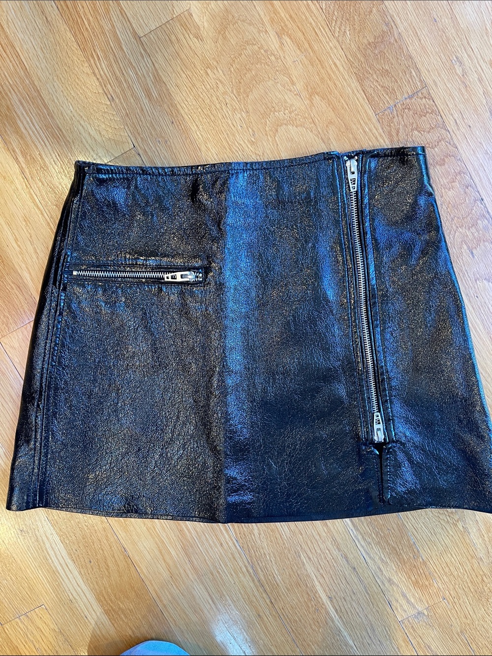 Blank NYC Shiny Black Faux Leather Mini Skirt with Zip Details